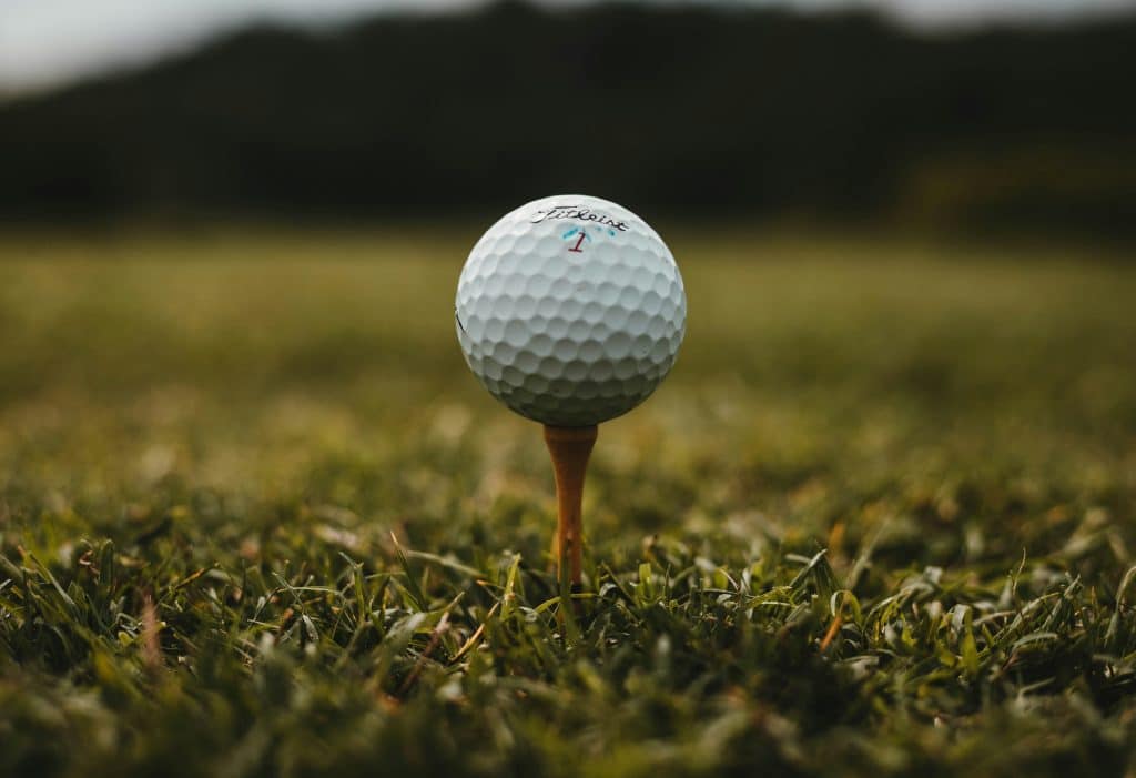 Golf ball waiting on the tee, for the Open championship betting guide